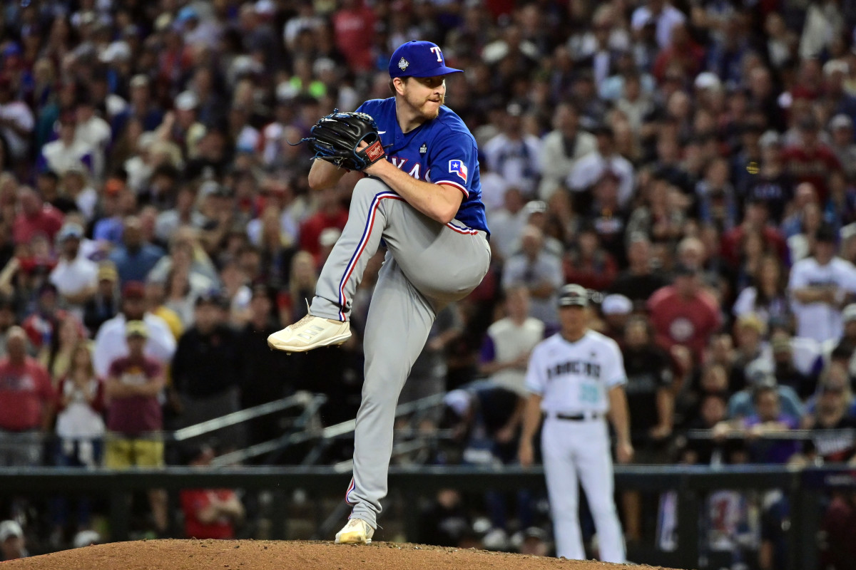 Oct 30, 2023; Phoenix, Arizona, USA; Texas Rangers relief pitcher Josh Sborz (66) pitches in the seventh inning against the Arizona Diamondbacks in game three of the 2023 World Series at Chase Field. Mandatory Credit: Matt Kartozian-USA TODAY Sports